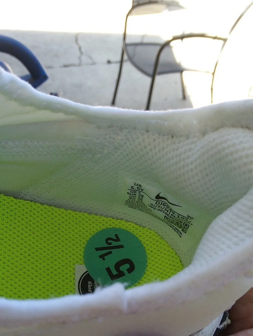 Nike White Sneakers with Black Swoosh Accents